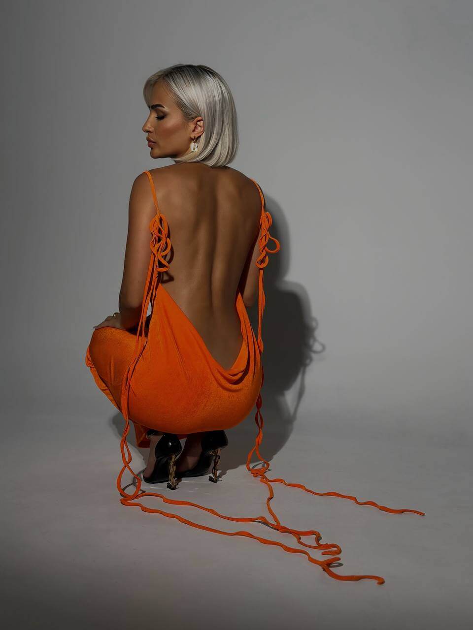 Elegant long evening dress with open back