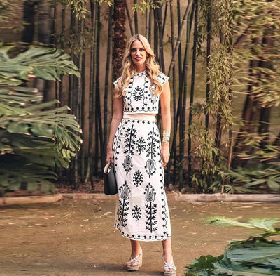 Printed sleeveless top and flowing skirt set, ideal for casual events