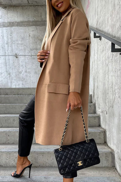 Elegant coat with pockets and a turn-down collar: the perfect style for any occasion
