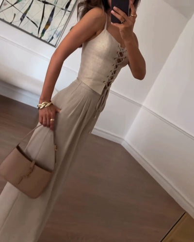 Two-piece set with a thin strap knotted top and flowing straight-leg pants