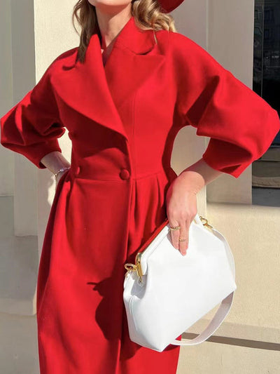 Subtle style with lantern sleeves and wide lapels
