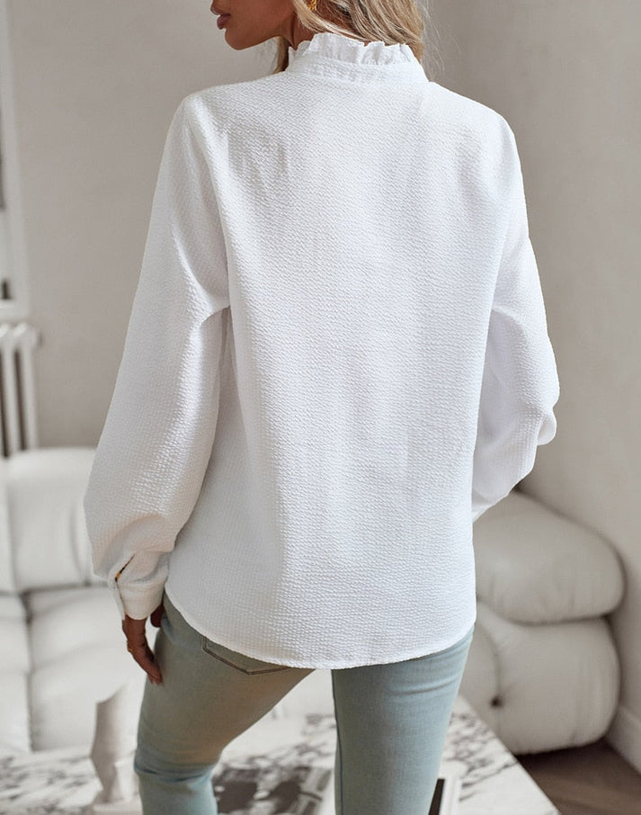 Elegant and versatile blouse perfect for any occasion