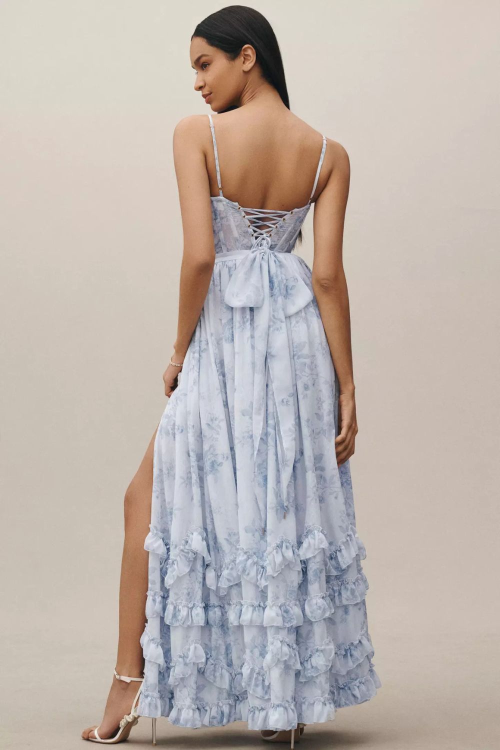 Long corset dress with thin straps and ruffled hem in a floral design