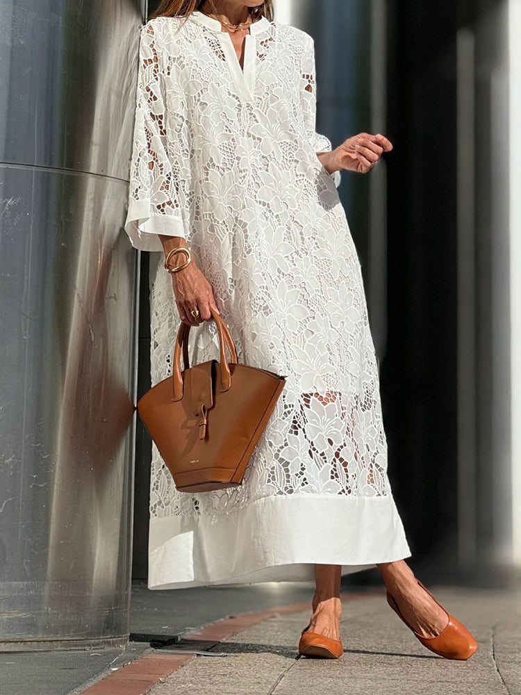 Elegant long dress with long sleeves and a loose fit for special events