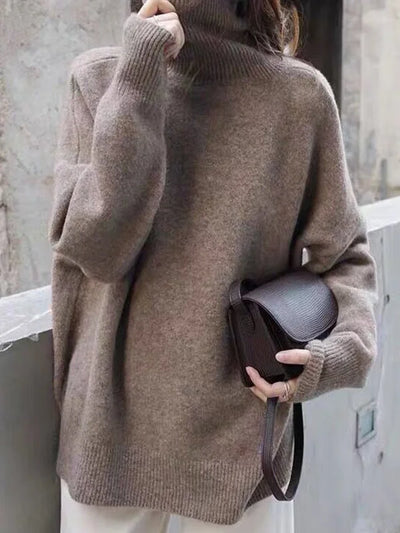 Elegant oversized sweater with long sleeves and a high neck