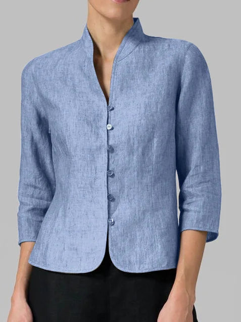 Women's blouse with structured high neck and button details