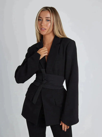 Elegant women's blazer with belt and lapels