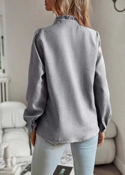 Elegant and versatile blouse perfect for any occasion