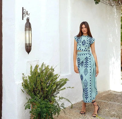 Printed sleeveless top and flowing skirt set, ideal for casual events