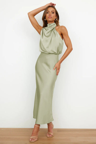Elegant long dress with asymmetrical neckline and sophisticated design
