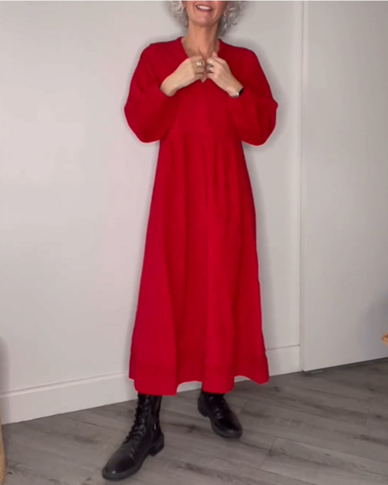 Elegant long dress with a V-neckline and long sleeves