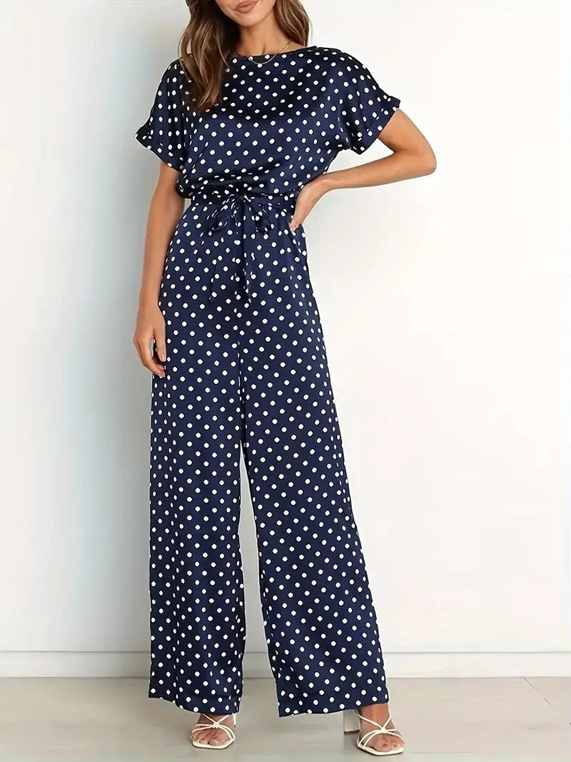 Women's long jumpsuit with elegant design and polka dot print
