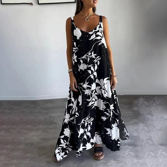 Long sleeveless dress with floral print, ideal for sunny days