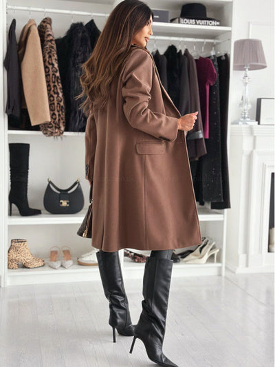 Elegant women's long coat with button closure