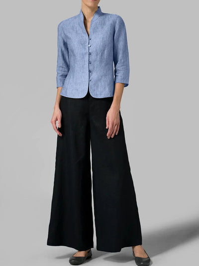 Women's blouse with structured high neck and button details