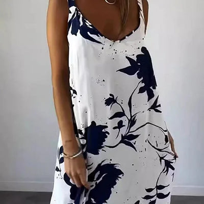 Long sleeveless dress with floral print, ideal for sunny days