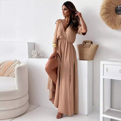 Elegant long dress with a crossover neckline and flowing side slit