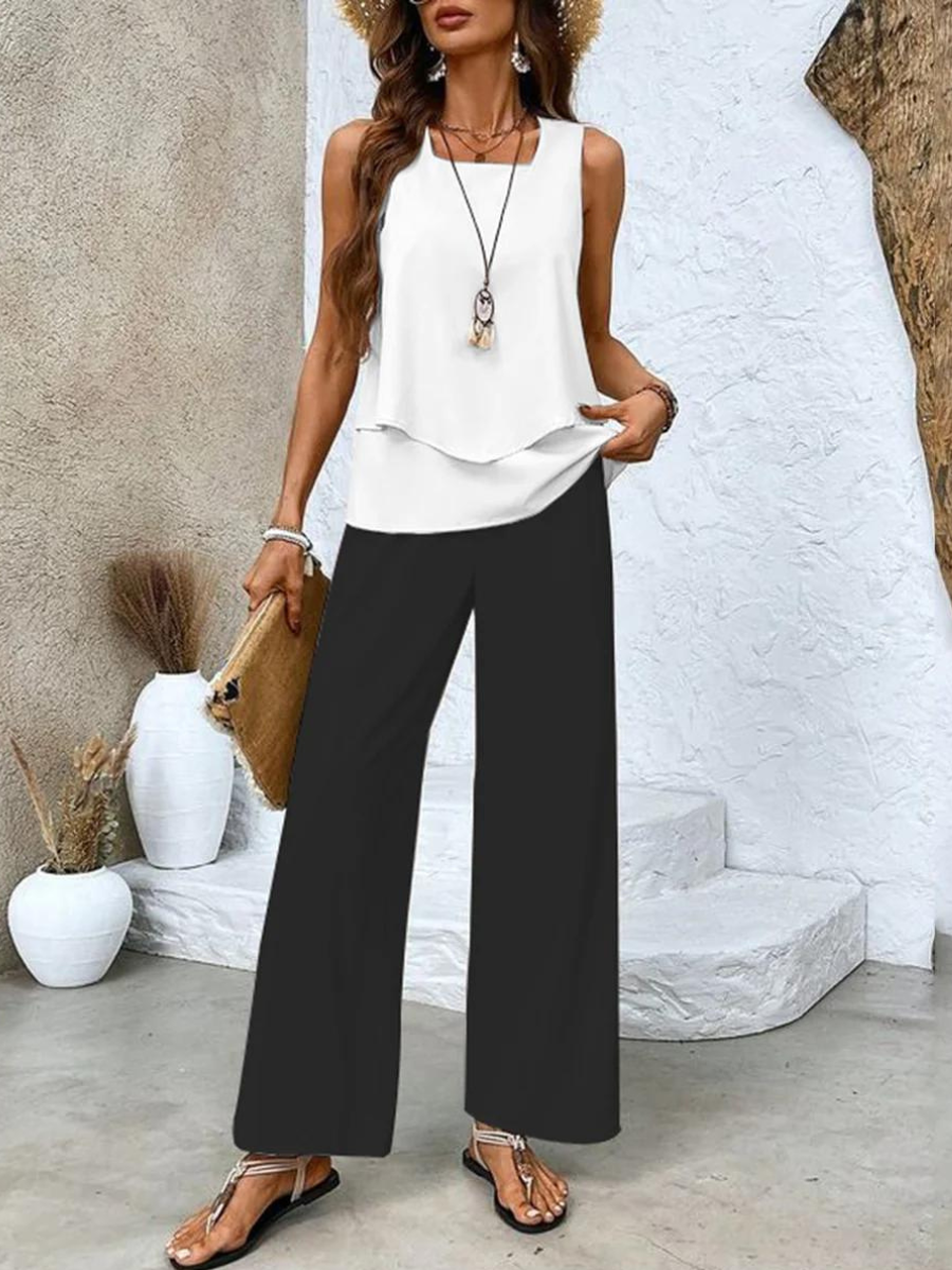 Elegant summer set for women with a sleeveless blouse and wide-legged pants