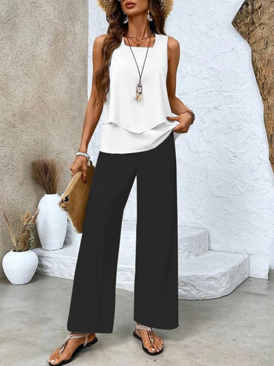 Elegant summer set for women with a sleeveless blouse and wide-legged pants