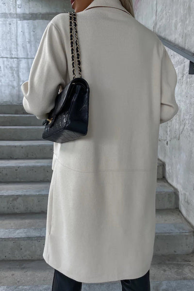 Elegant coat with pockets and a turn-down collar: the perfect style for any occasion