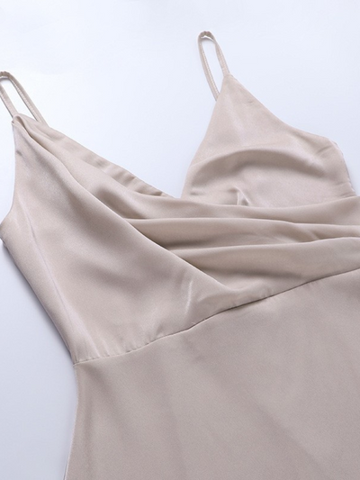 Elegant long dress with thin straps, plunging neckline and side slit