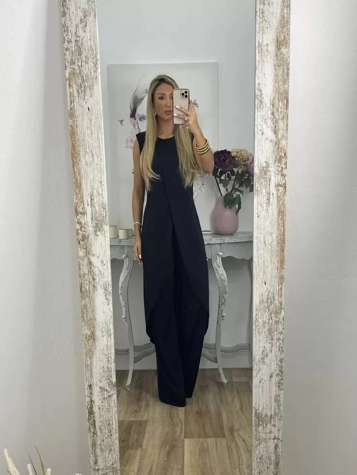 Women's two-piece set with a long sleeveless tunic and straight-leg trousers