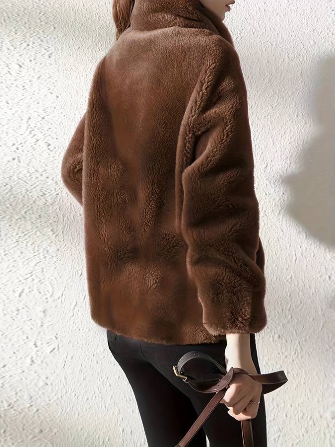 Women's jacket with a modern design and practical pockets