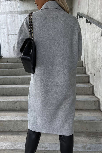 Elegant coat with pockets and a turn-down collar: the perfect style for any occasion