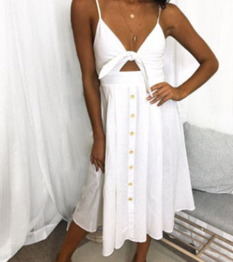 Elegant summer dress with thin straps and crossover details for special occasions