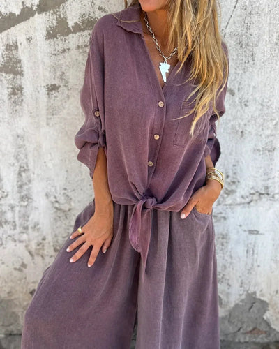 Light summer outfit with a long-sleeved button-down shirt and wide-legged pants