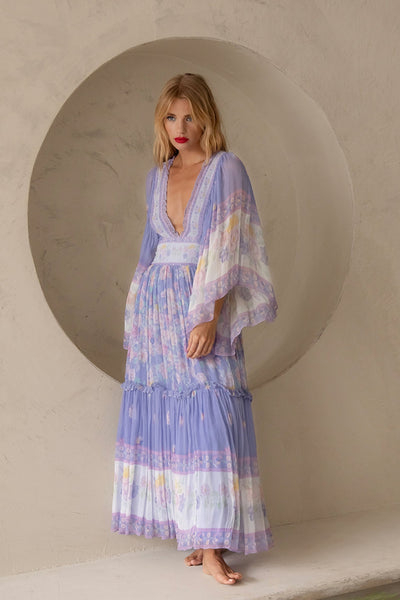 Long flowing dress with ruffles and long sleeves for summer