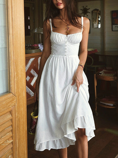 Plain midi dress with thin straps and ruffle at the hem