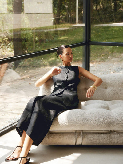 Women's classic sleeveless button-down cardigan and long skirt set
