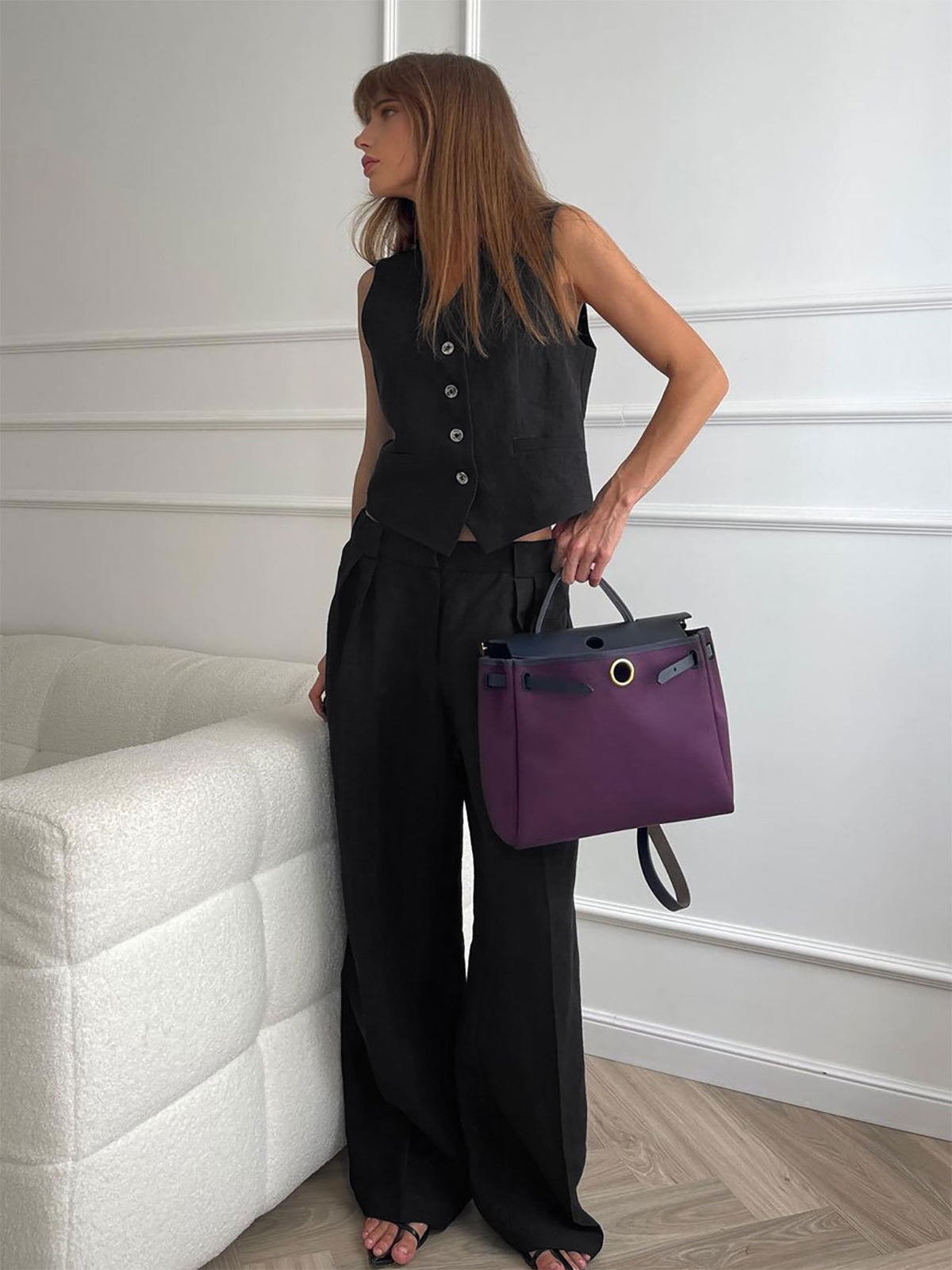 Elegant summer set with wide-legged trousers and a classic button-down vest