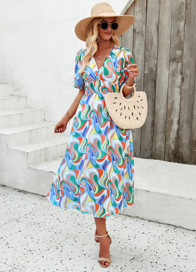 Elegant long dress with a V-neckline and subtle print