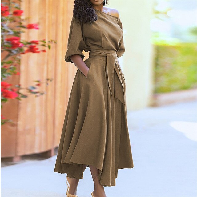 Elegant and modern midi dress with elbow-length sleeves and an adjustable waist