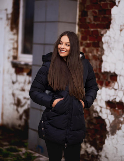 Elegant and warm women's parka with a deep hood