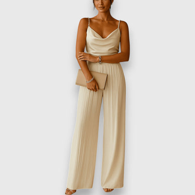 Elegant spaghetti strap jumpsuit with wide pleated pants