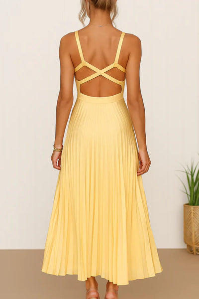 Long summer dress with a plunging neckline, open back, and elegant pleated skirt