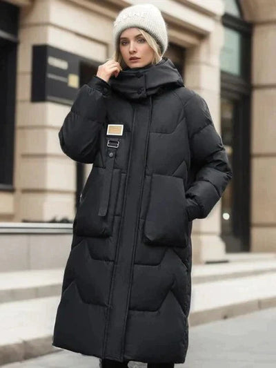 Long women's jacket with a modern design and sophisticated style