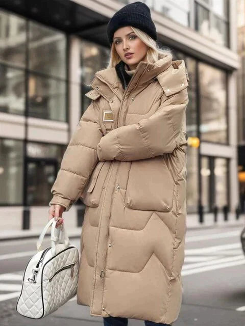 Long women's jacket with a modern design and sophisticated style