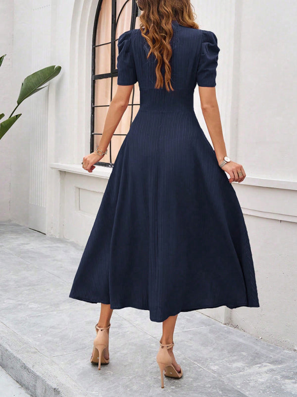 Midi cocktail dress with gathered waist, flared cut, and puff sleeves
