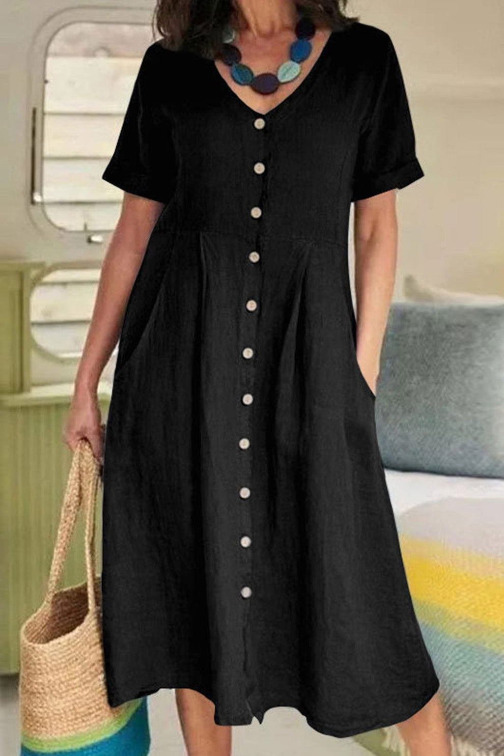 Lightweight midi dress with short sleeves and button-down shirt style