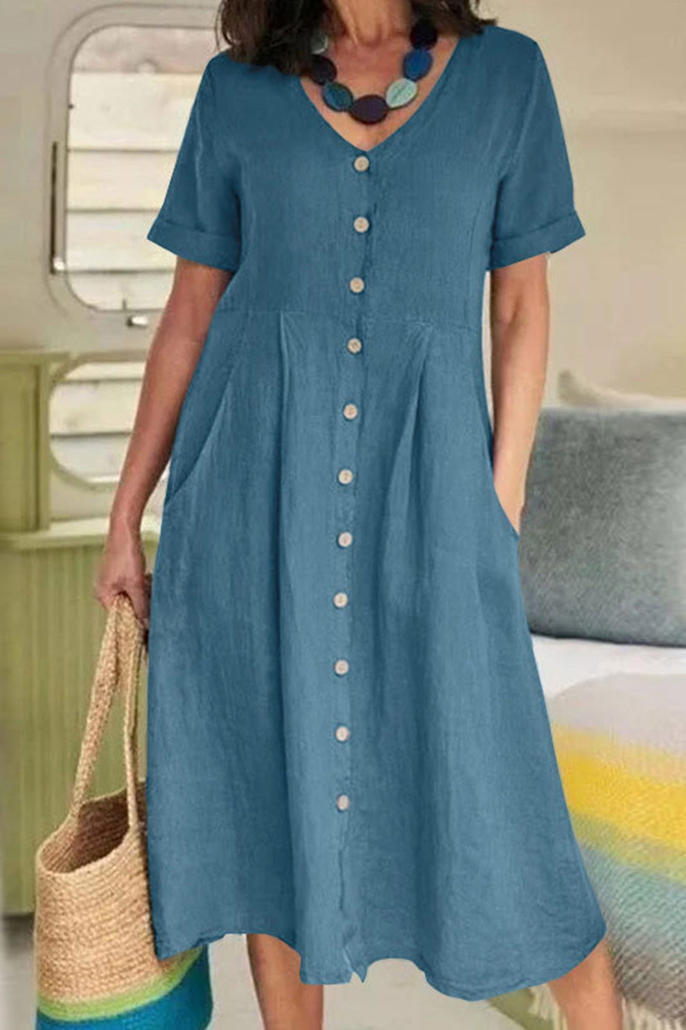 Lightweight midi dress with short sleeves and button-down shirt style