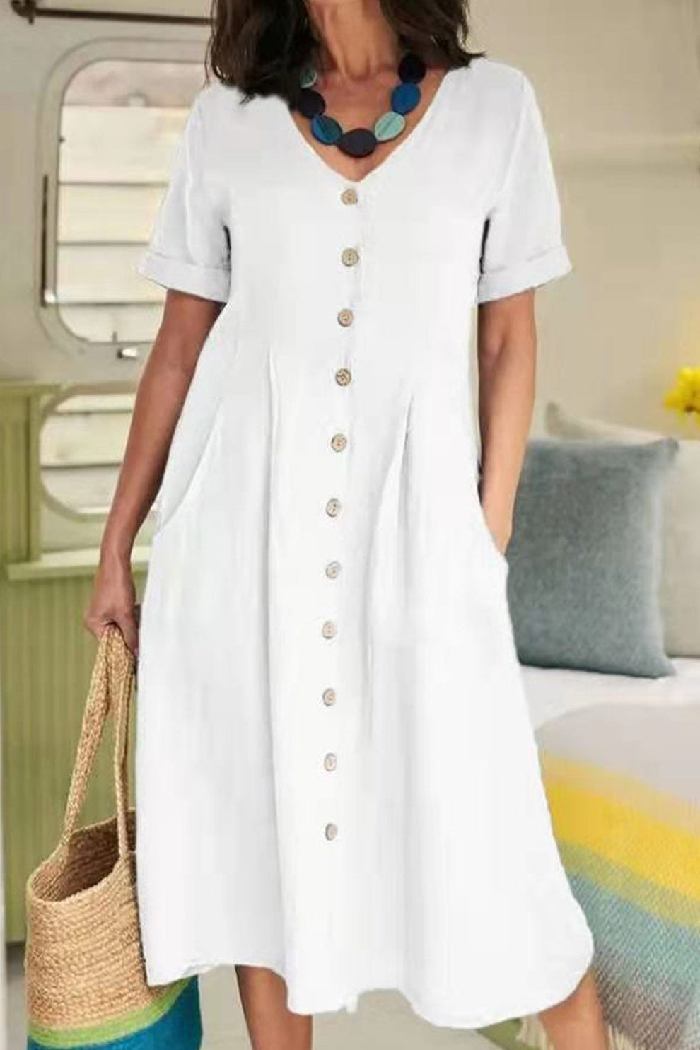 Lightweight midi dress with short sleeves and button-down shirt style