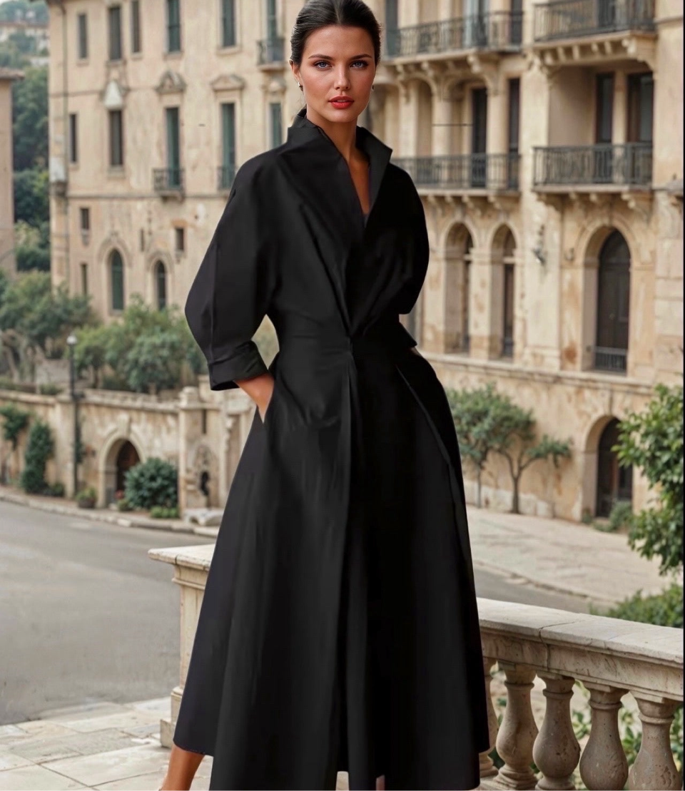 Elegant midi dress with a wide line, high neck and three-quarter sleeves