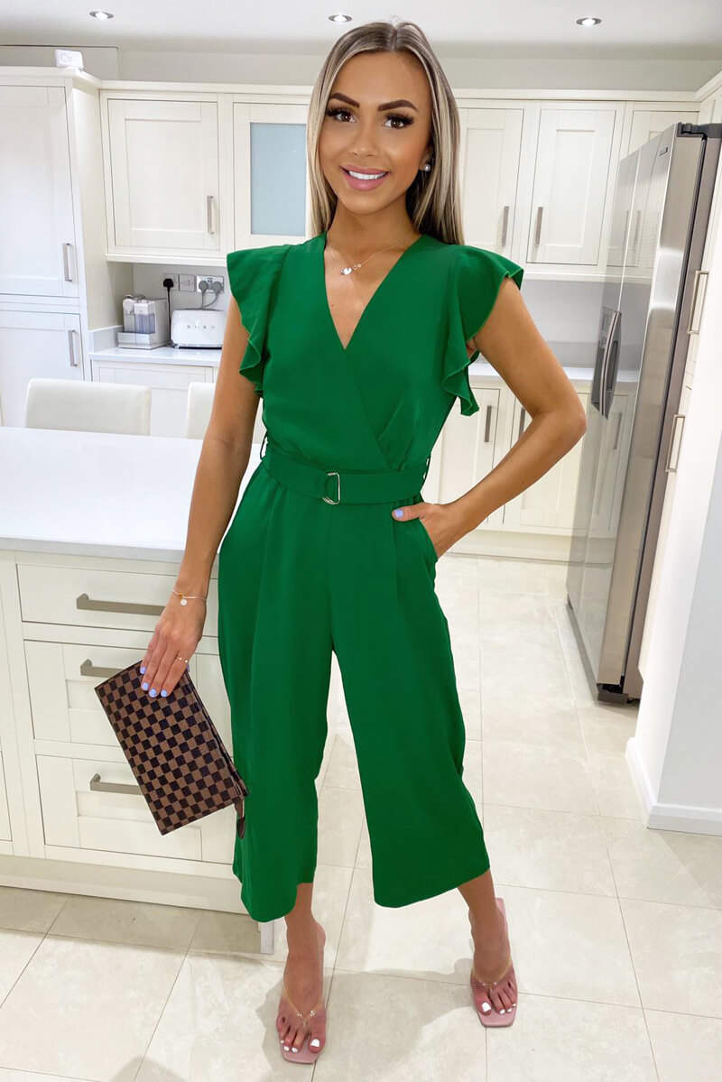 Jumpsuit with crossover neckline, integrated belt and wide-legged trousers