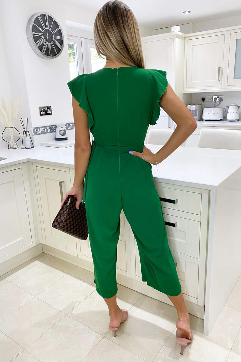 Jumpsuit with crossover neckline, integrated belt and wide-legged trousers
