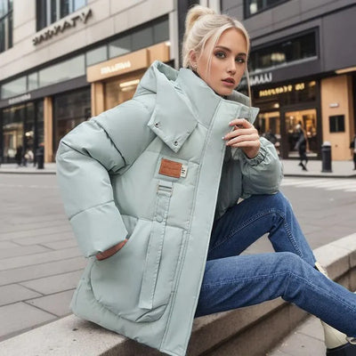 Modern women's coat with a wide hood and elegant design