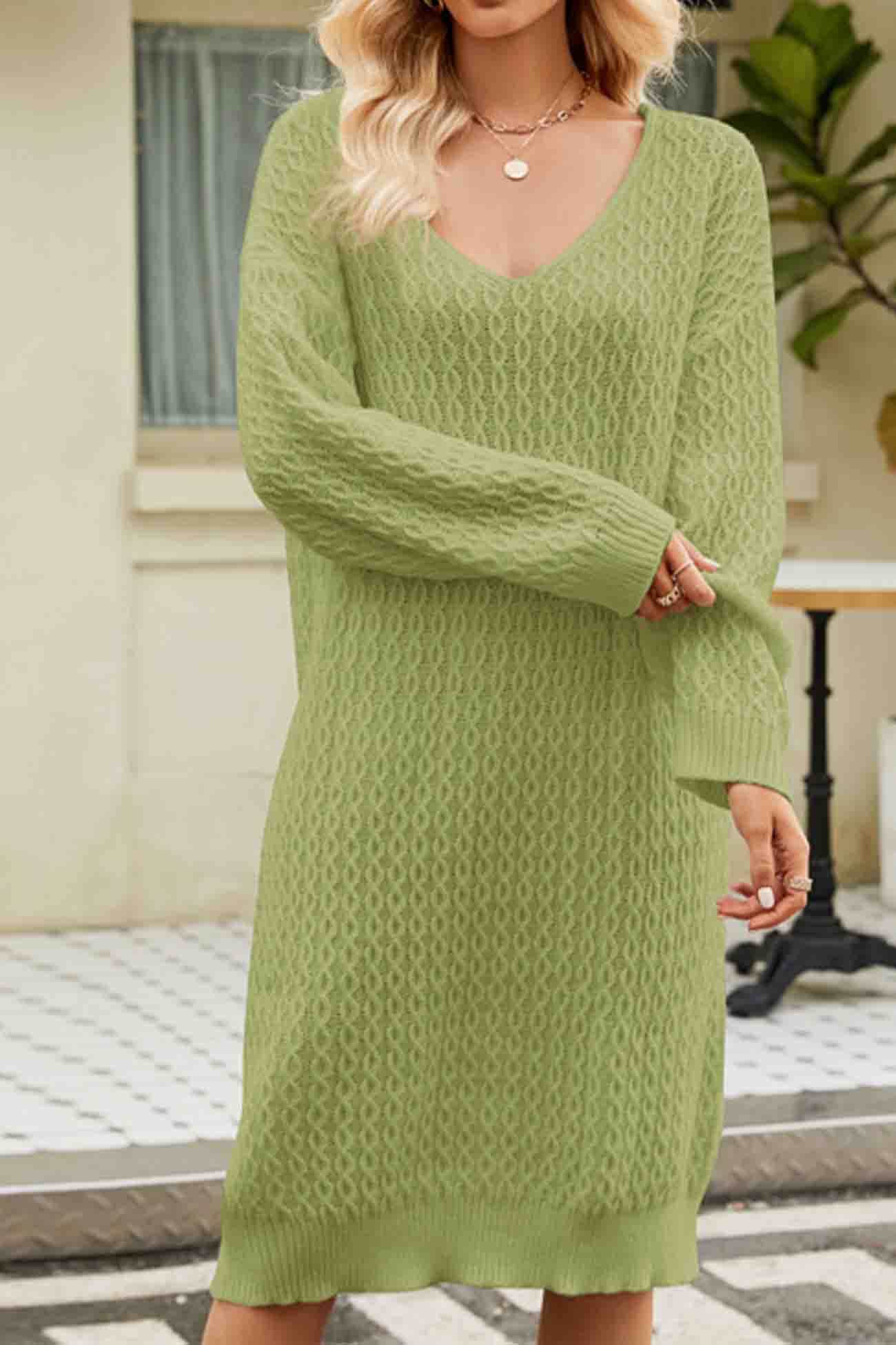 Elegant sweater dress with a deep V-neckline for sophisticated looks